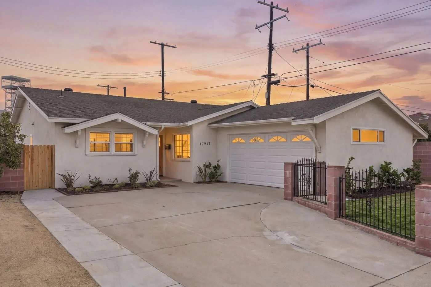 The remodeled single story home at 17217 South Hoover Street, Gardena, at twilight