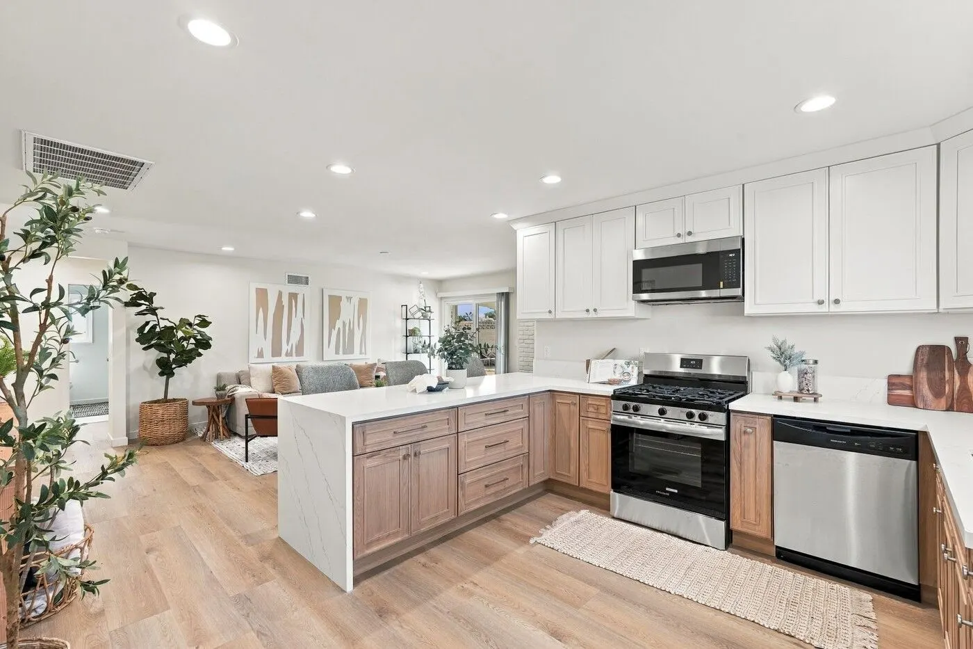 White and oak kitchen with a quartz island, 17217 South Hoover Street, Gardena