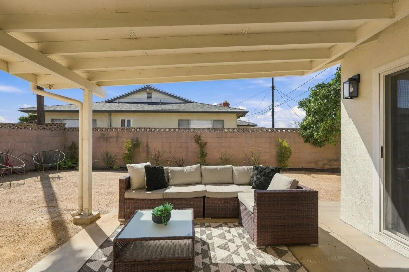 Covered patio lounge in the backyard, 17217 South Hoover Street, Gardena