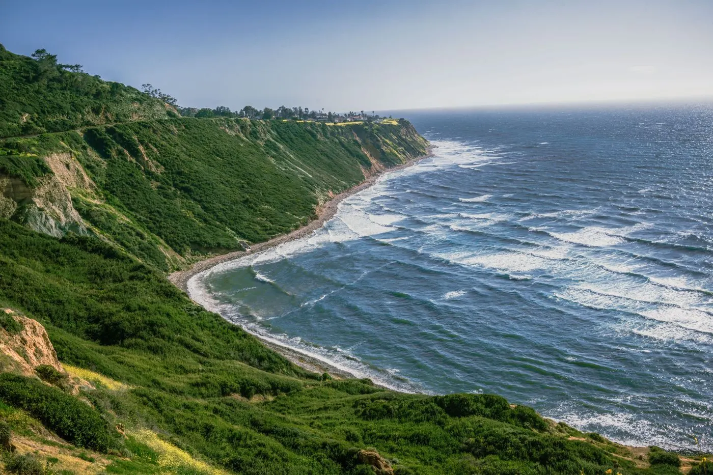 The green Palos Verdes coastline and surf