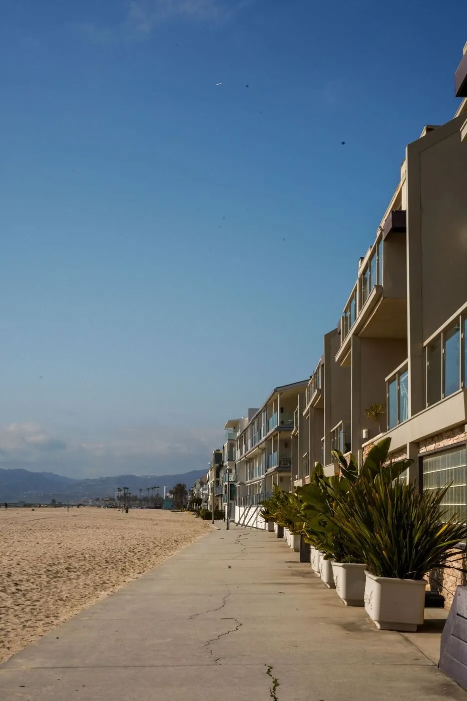 The South Bay beach walk lined with modern beach houses